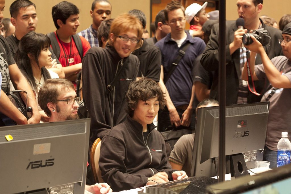 Daigo Umehara playing at a fighting game event in July 2011